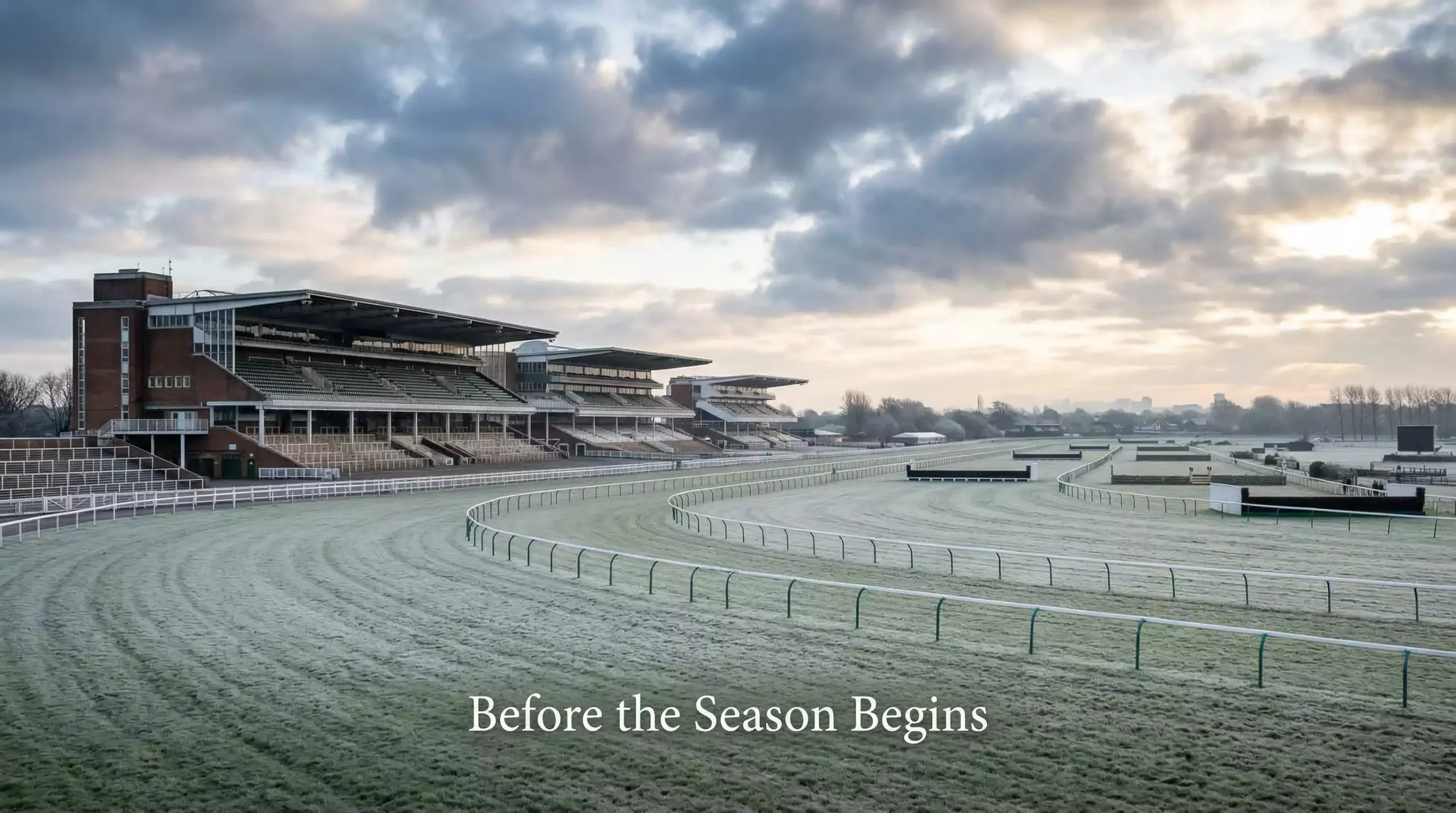 An early morning view of Aintree racecourse with empty stands months before the Grand National